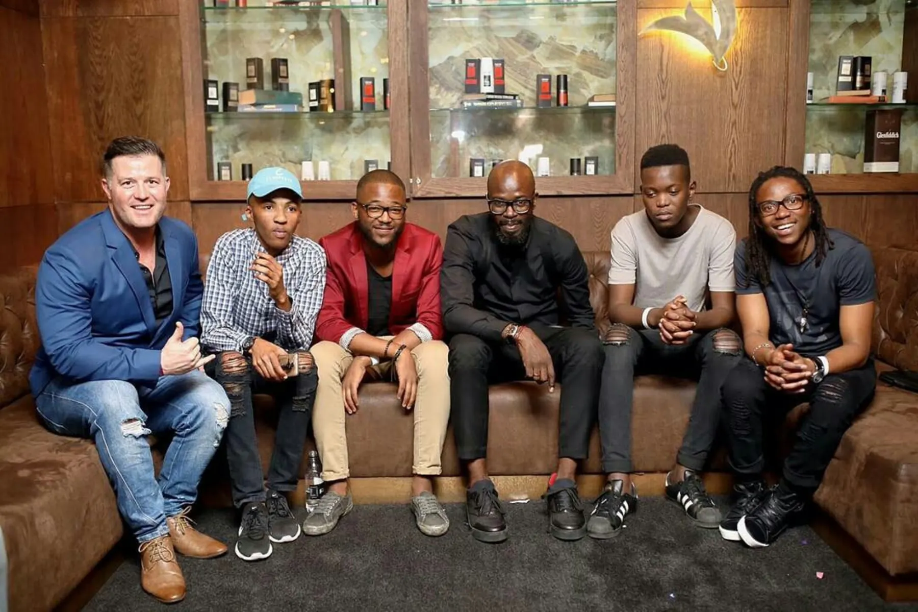 Group photo on a lounge couch